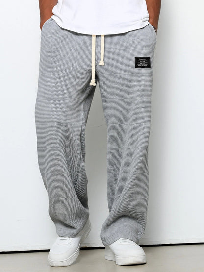 Elvarya – Wide-Leg Waffle-Knit Trousers